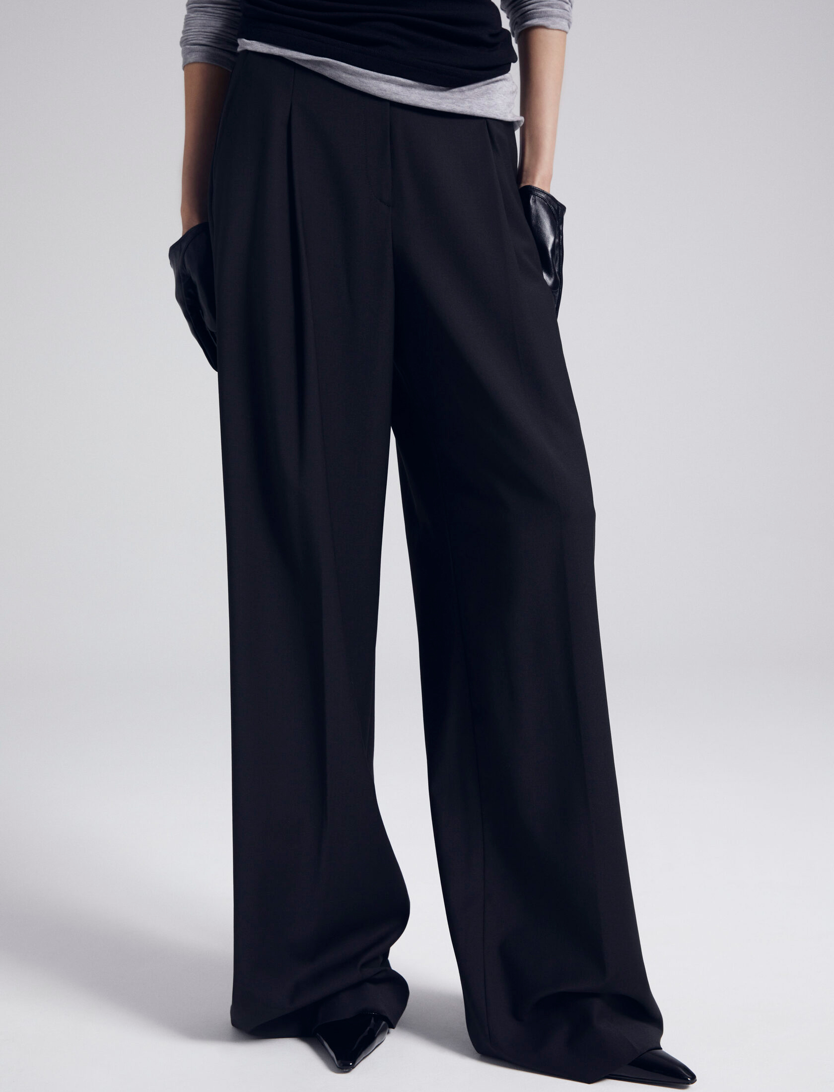 Брюки с защипами свободного кроя